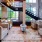 a room with couches and a staircase
