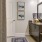 a bathroom with a mirror and sink