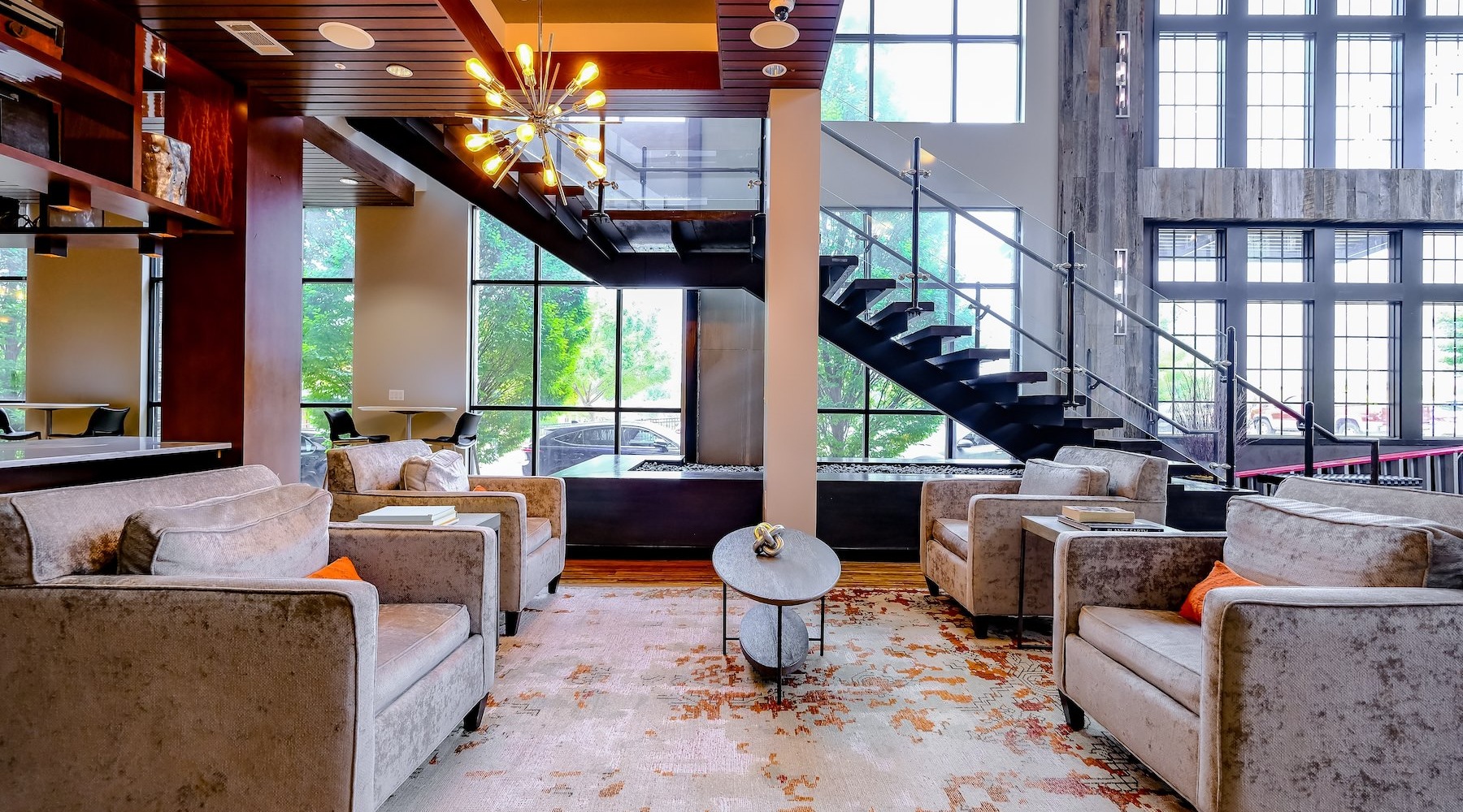 clubhouse with seating and stairwell