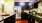 a kitchen with black cabinets