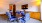 a conference room with blue chairs