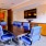 a conference room with blue chairs