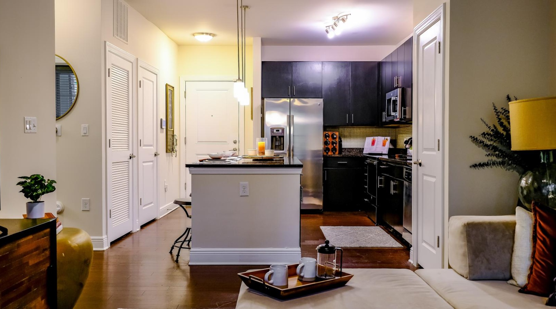 a kitchen with a table and chairs