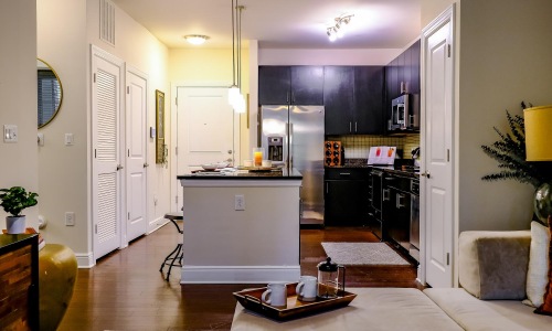 a kitchen with a table and chairs
