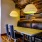 a lounge with a table and chairs