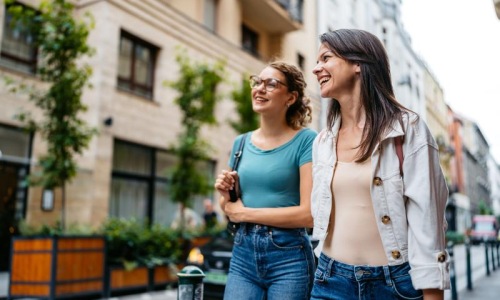 A beautiful community at the heart of all your passions a couple of women laughing