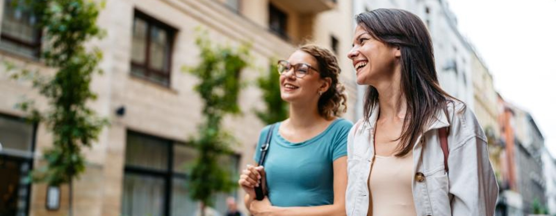 a couple of women laughing